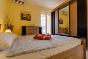 Postel nebo postele na pokoji v ubytování Montenegro Apartments Utjeha