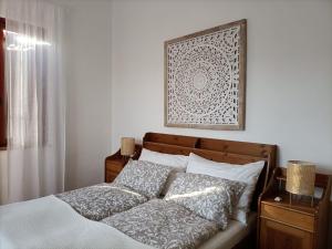 Säng eller sängar i ett rum på Casale Il Girasole