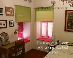 A bed or beds in a room at Valtsiora guesthouse