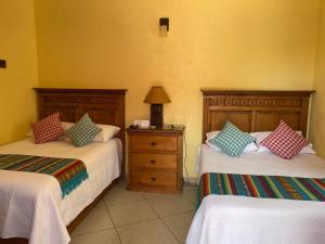 Postel nebo postele na pokoji v ubytování CASONA DOS VIDAS + 21 fotografií
