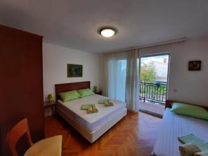 Postel nebo postele na pokoji v ubytování Holiday Home Marija