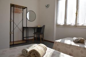 Łóżko lub łóżka w pokoju w obiekcie Villa La Parisienne