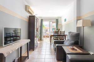 TV a/nebo společenská místnost v ubytování Apartamentos Mundaka Albir
