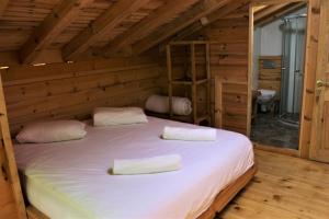 Postel nebo postele na pokoji v ubytování Sumda Konaklar