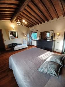 En eller flere senger på et rom på Villa Daniela