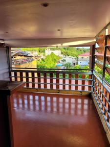 a balcony with a view of a city at Yangou Appart 2 in Mamoudzou