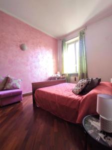 Posteľ alebo postele v izbe v ubytovaní Rainbow house Lingotto Inalpi
