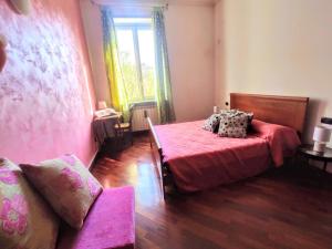 Posteľ alebo postele v izbe v ubytovaní Rainbow house Lingotto Inalpi