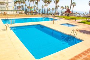 Bazén v ubytovaní Aloha Playa Apartment with panoramic sea view and pools alebo v jeho blízkosti