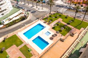 Bazén v ubytovaní Aloha Playa Apartment with panoramic sea view and pools alebo v jeho blízkosti