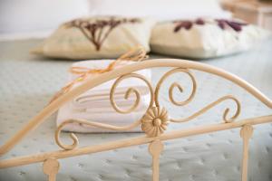 Letto o letti in una camera di Dimora Aia Piccola