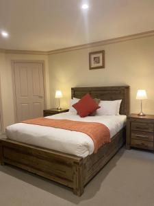 Ένα ή περισσότερα κρεβάτια σε δωμάτιο στο Emerald Creek Cottages