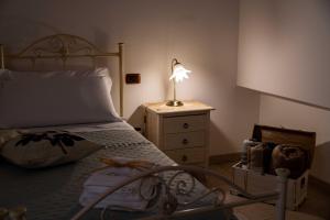 Letto o letti in una camera di Dimora Aia Piccola