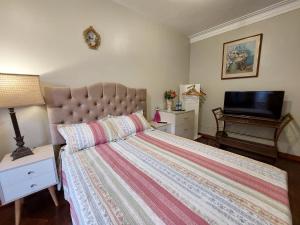 TV a/nebo společenská místnost v ubytování Casa Amarello