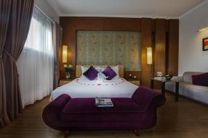 Voodi või voodid majutusasutuse Eliana Ruby Hotel & Travel toas