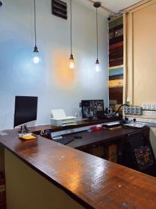 Una cocina o cocineta en ZZZ SLEEP MODE CAPSULE