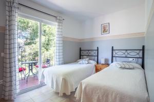 Postel nebo postele na pokoji v ubytování Apartamentos Mundaka Albir