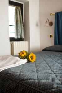 Posteľ alebo postele v izbe v ubytovaní Hotel Liberty