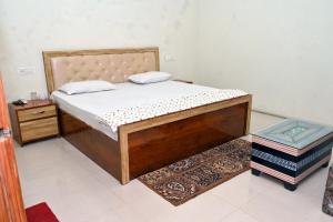 Postel nebo postele na pokoji v ubytování Corridor inn