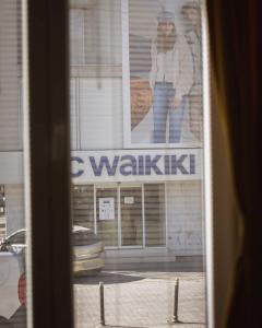 a view of a building with a walmart sign at Darki Apartment - Bazaar Location With Free Parking in Ohrid
