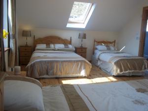 Uma cama ou camas num quarto em Mountainview B&B