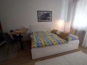 Postel nebo postele na pokoji v ubytování Útulný byt s výhľadom na Tatry