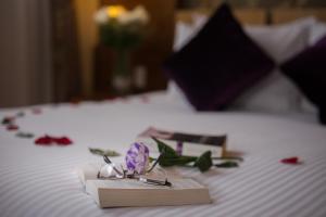 Voodi või voodid majutusasutuse Eliana Ruby Hotel & Travel toas