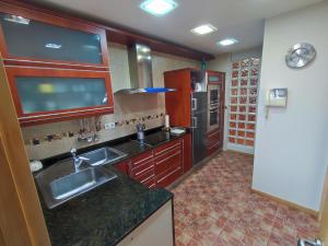 A kitchen or kitchenette at Ático Anllóns