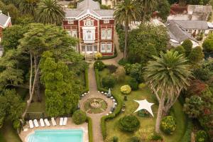 an aerial view of a house with a swimming pool at Villa La Argentina in Luarca