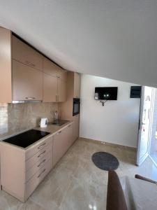 Kuchyň nebo kuchyňský kout v ubytování Venice Apartments + 18 fotografií