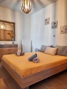 Postel nebo postele na pokoji v ubytování Villa Adeiata