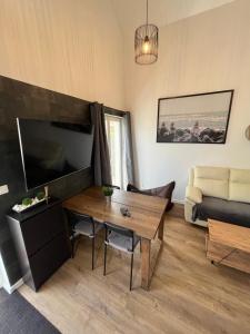 TV a/nebo společenská místnost v ubytování Apartmán Provence Deluxe
