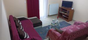 Televízia a/alebo spoločenská miestnosť v ubytovaní DESPOINA APARTMENT 2 Relax + 7 fotografií