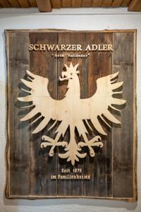 Ein Zertifikat, Auszeichnung, Logo oder anderes Dokument, das in der Unterkunft Gasthof Schwarzer Adler in Hägerau-Steeg Naturpark Lechtal ausgestellt ist