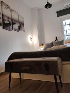Posteľ alebo postele v izbe v ubytovaní Budha Luxury Apartment Centro Histórico de Málaga