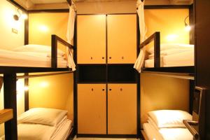 Letto o letti in una camera di DONGMEN 3 Hostel