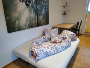 Postel nebo postele na pokoji v ubytování Apartment im Haus mit Herz