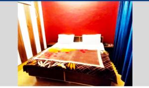 Postel nebo postele na pokoji v ubytování Hotel marwari niwas