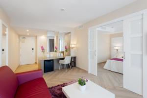 Posteľ alebo postele v izbe v ubytovaní Hotel Beverly Park & Spa