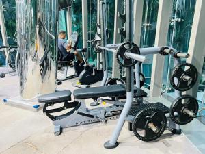 a man working out in a gym at City Center Residence Condominium Pattaya RJ in Pattaya Central