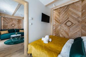 Ένα ή περισσότερα κρεβάτια σε δωμάτιο στο Apartament Sopa