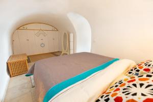 Tempat tidur dalam kamar di פינה שקטה בראש פינה העתיקה Pina Shketa in old Rosh-Pina