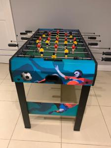 a table with a soccer game on top of it at Seascape on the edge of town: 4 beds all ensuite. in Belmullet