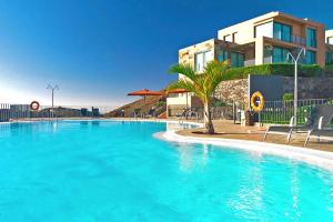 Πισίνα στο ή κοντά στο Salobre Los Lagos 10