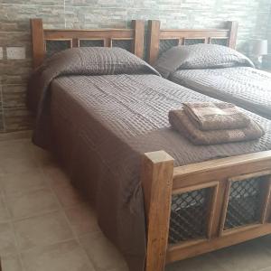 two twin beds in a room with at HAVEN HOUSE in Larnaka