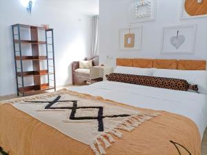 A bed or beds in a room at Casa Bakara Még 31 kép