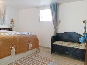 A bed or beds in a room at Casa Bakara