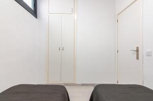 Postel nebo postele na pokoji v ubytování Central 2 Bedroom Apartment Playa de las Americas