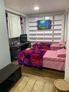 Postel nebo postele na pokoji v ubytování JAN Homestay Shillong + 11 fotografií