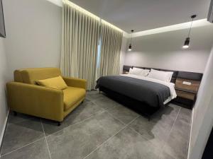 Postel nebo postele na pokoji v ubytování בוטיק רפאל Boutique Rafael + 36 fotografií